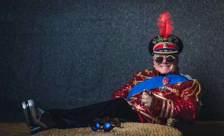 Elite Elton John Tribute Act in Military Hat